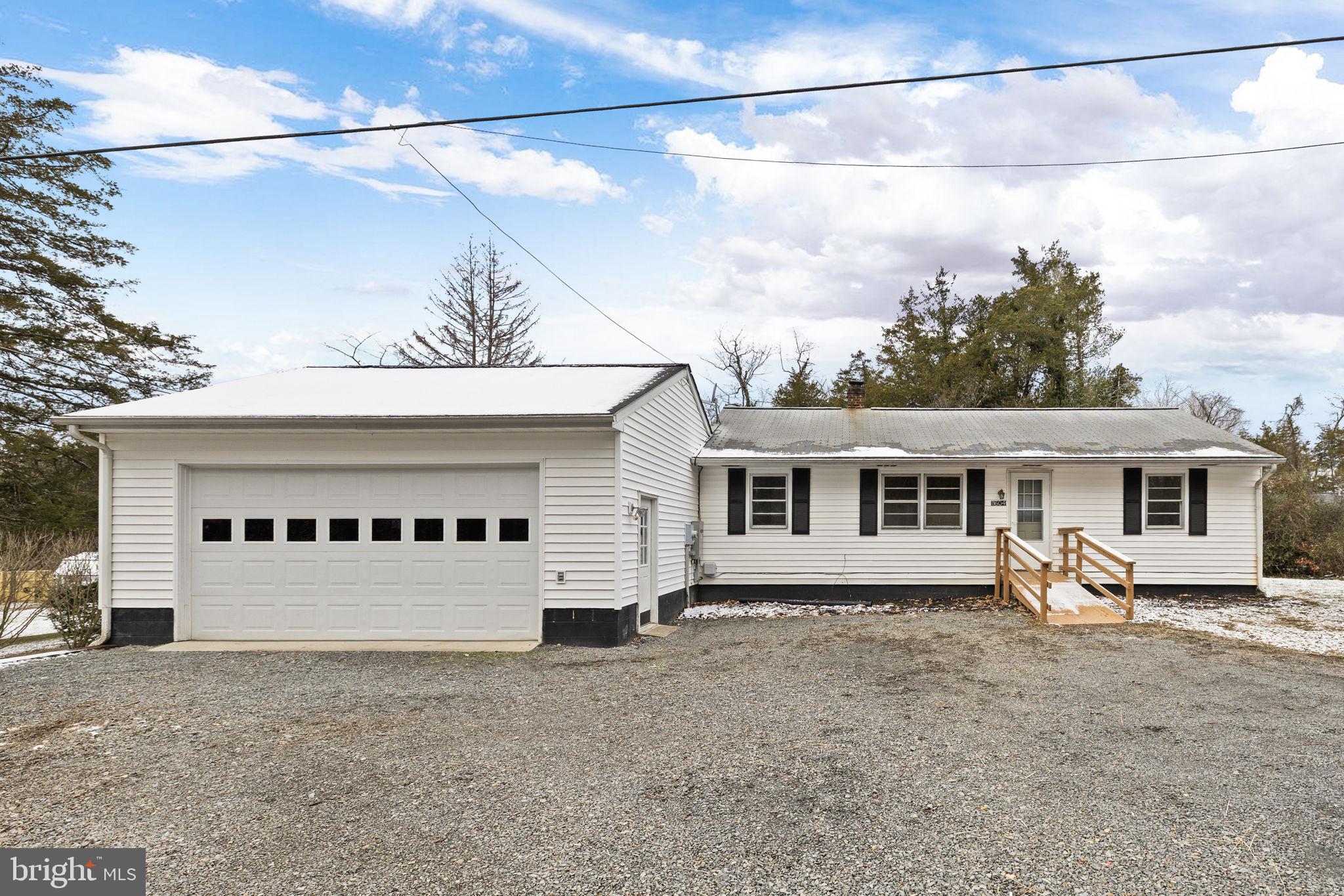 11604 Maple Tree Court Orange, VA 22960 - Photo 28 of 39 a view of a white house with a yard and street view
