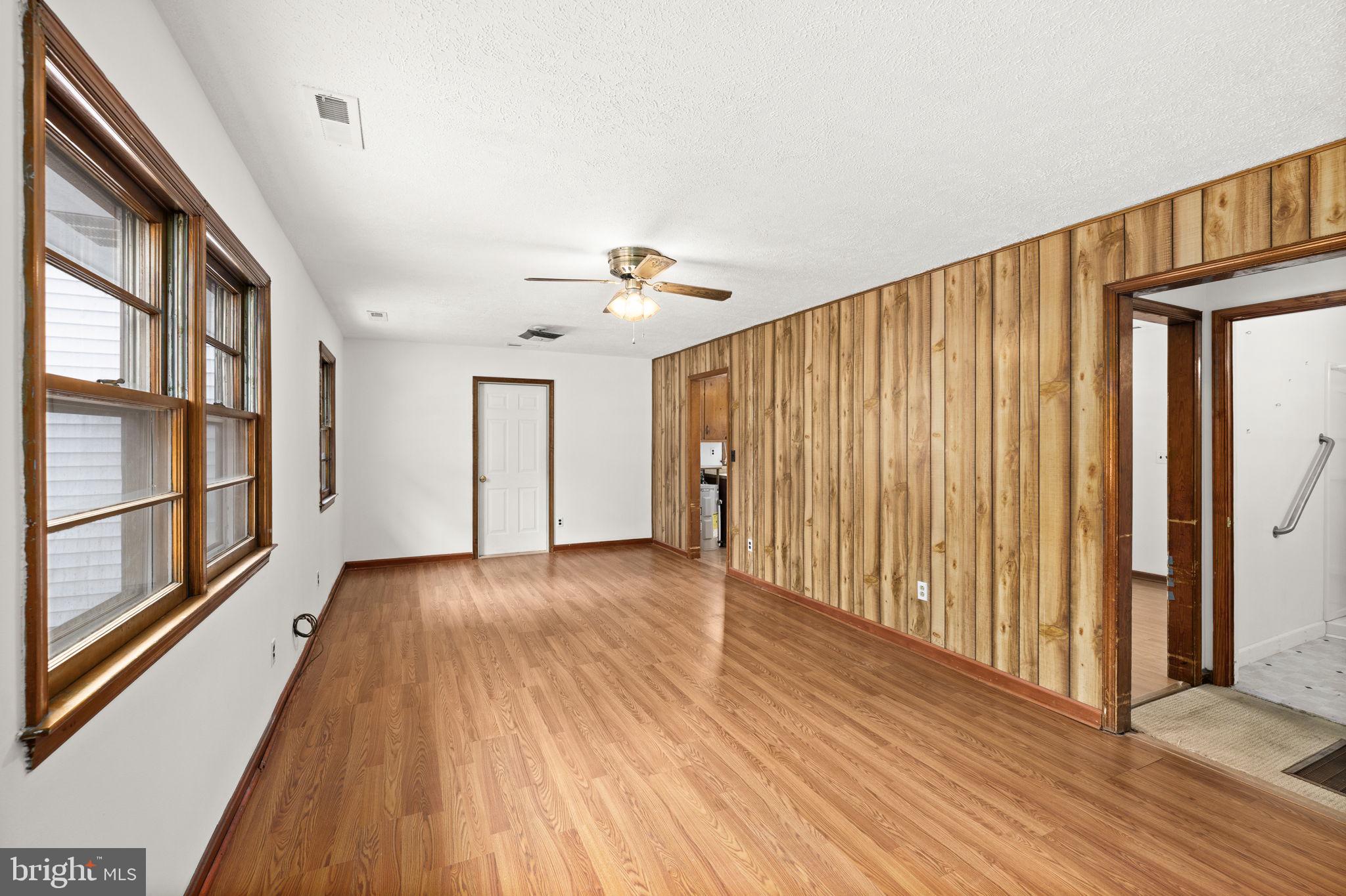 11604 Maple Tree Court Orange, VA 22960 - Photo 3 of 39 a view of a hallway with wooden floor