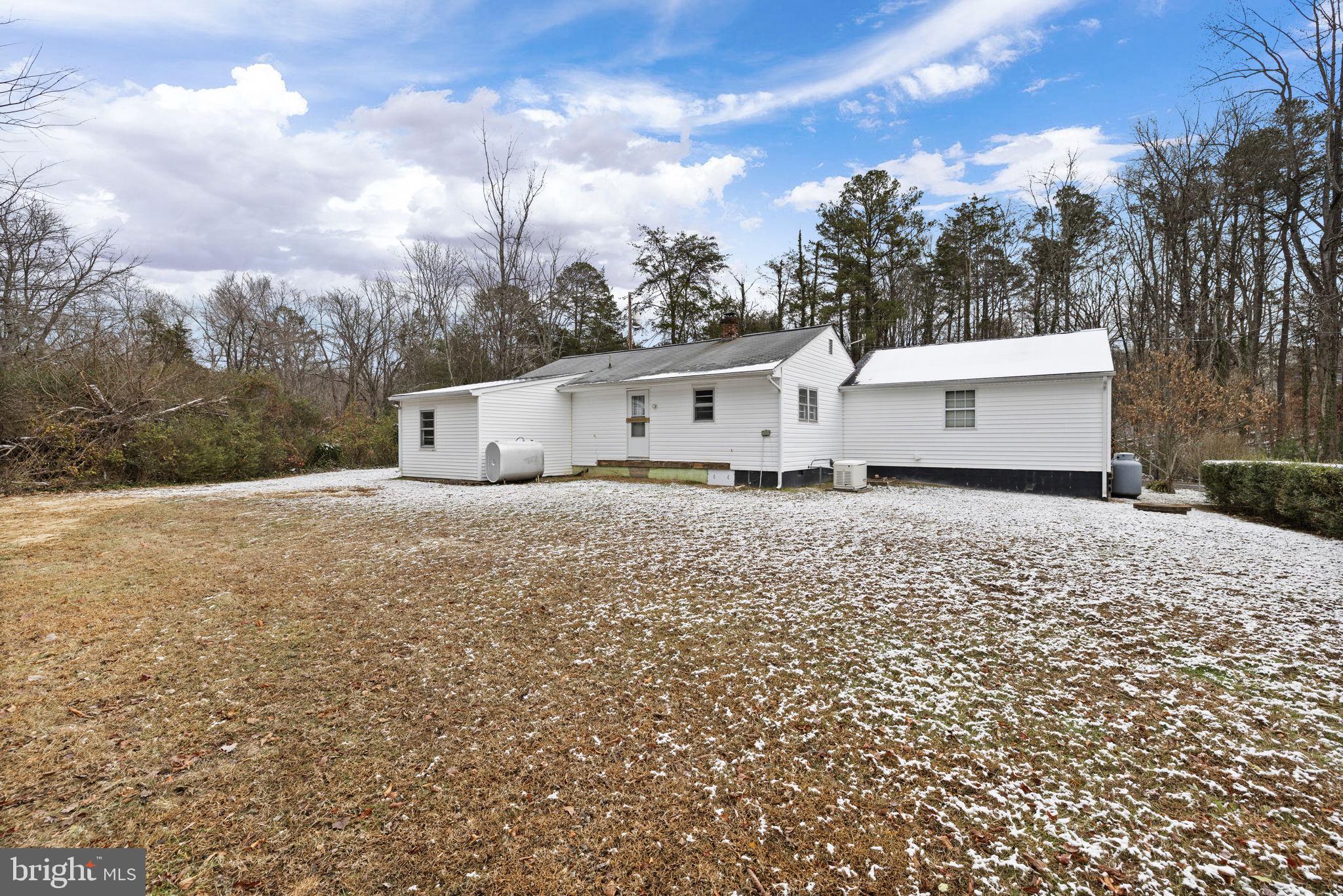 11604 Maple Tree Court Orange, VA 22960 - Photo 33 of 39 a view of white house with a yard