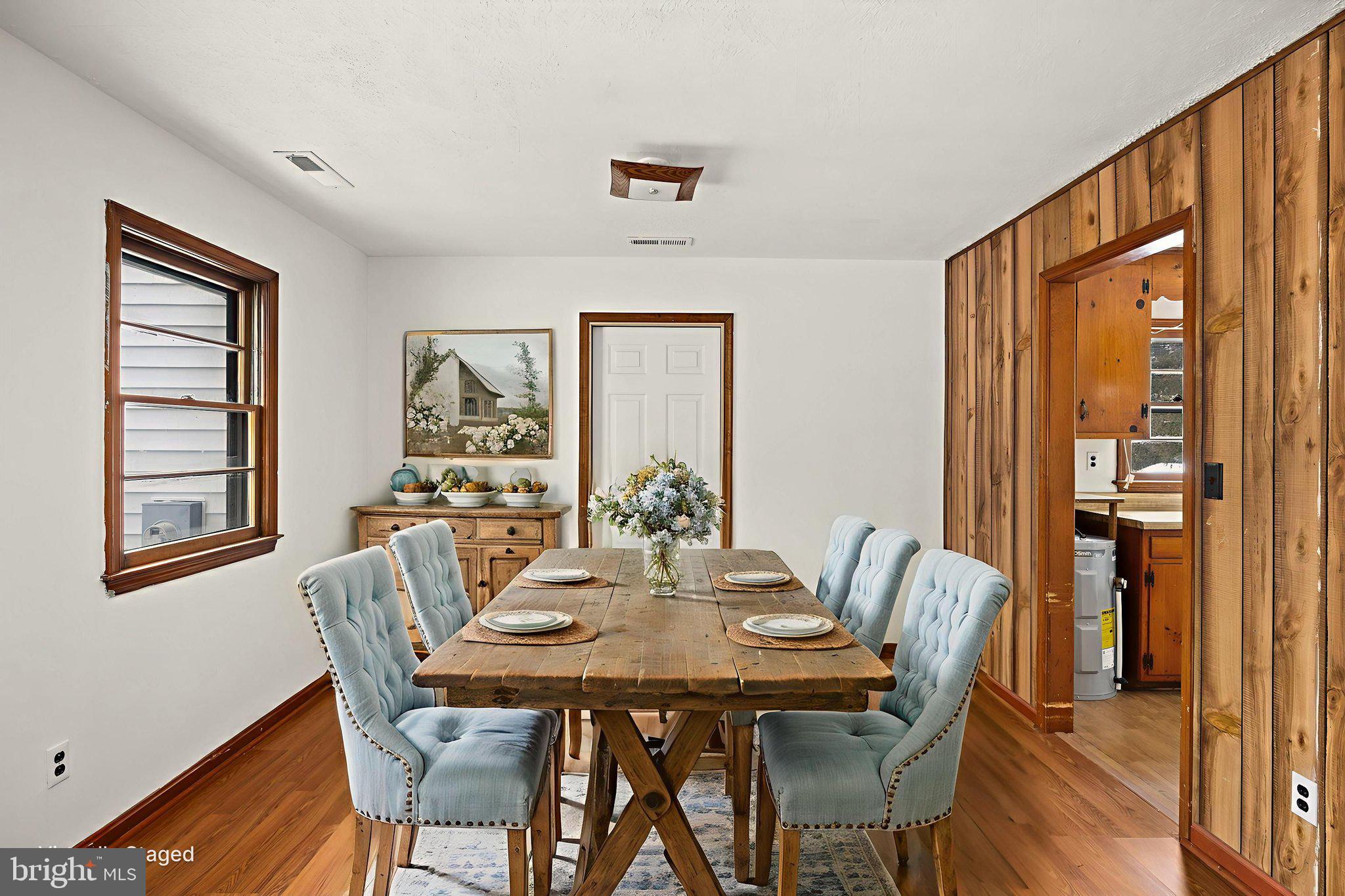 11604 Maple Tree Court Orange, VA 22960 - Photo 5 of 39 a view of a dining room with furniture window and wooden floor