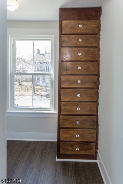 211 Washington Street, Unit 2 Hackettstown, NJ 07840 - Photo 23 of 30 a view of walk in closet with empty racks
