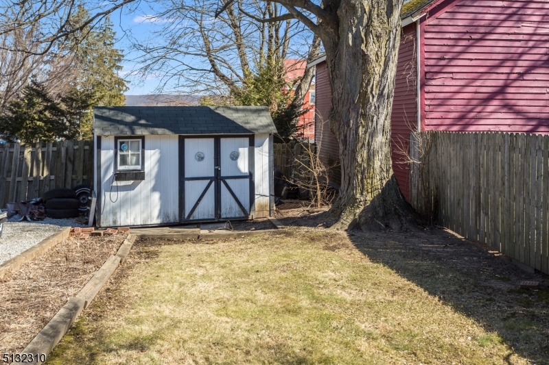 211 Washington Street, Unit 2 Hackettstown, NJ 07840 - Photo 28 of 30 a view of a backyard with a large tree