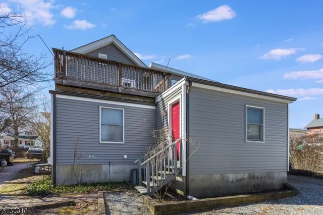a front view of a house with garage