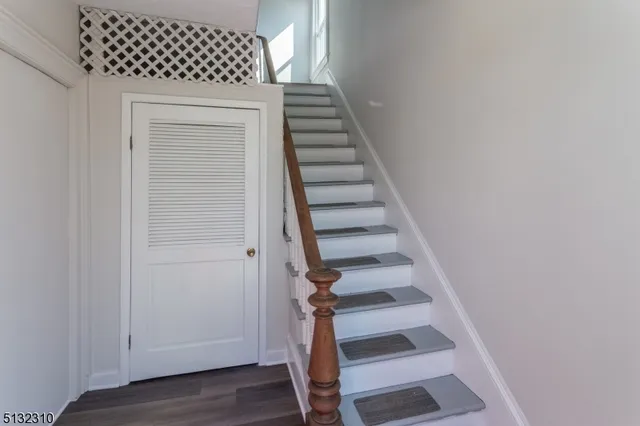 a view of entryway with wooden floor