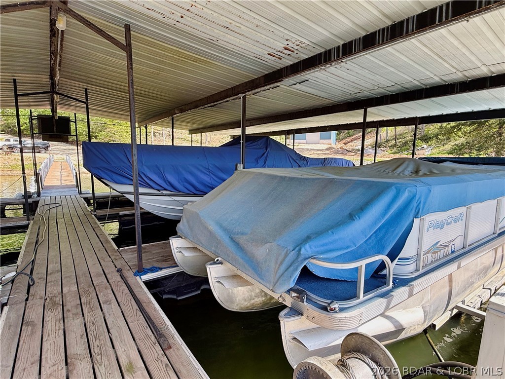 31137 Highland Road Rocky Mount, MO 65072 - Photo 5 of 23 10X24 boat slip included, boat available for addit