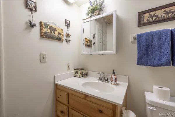 a bedroom with a bed and a machine