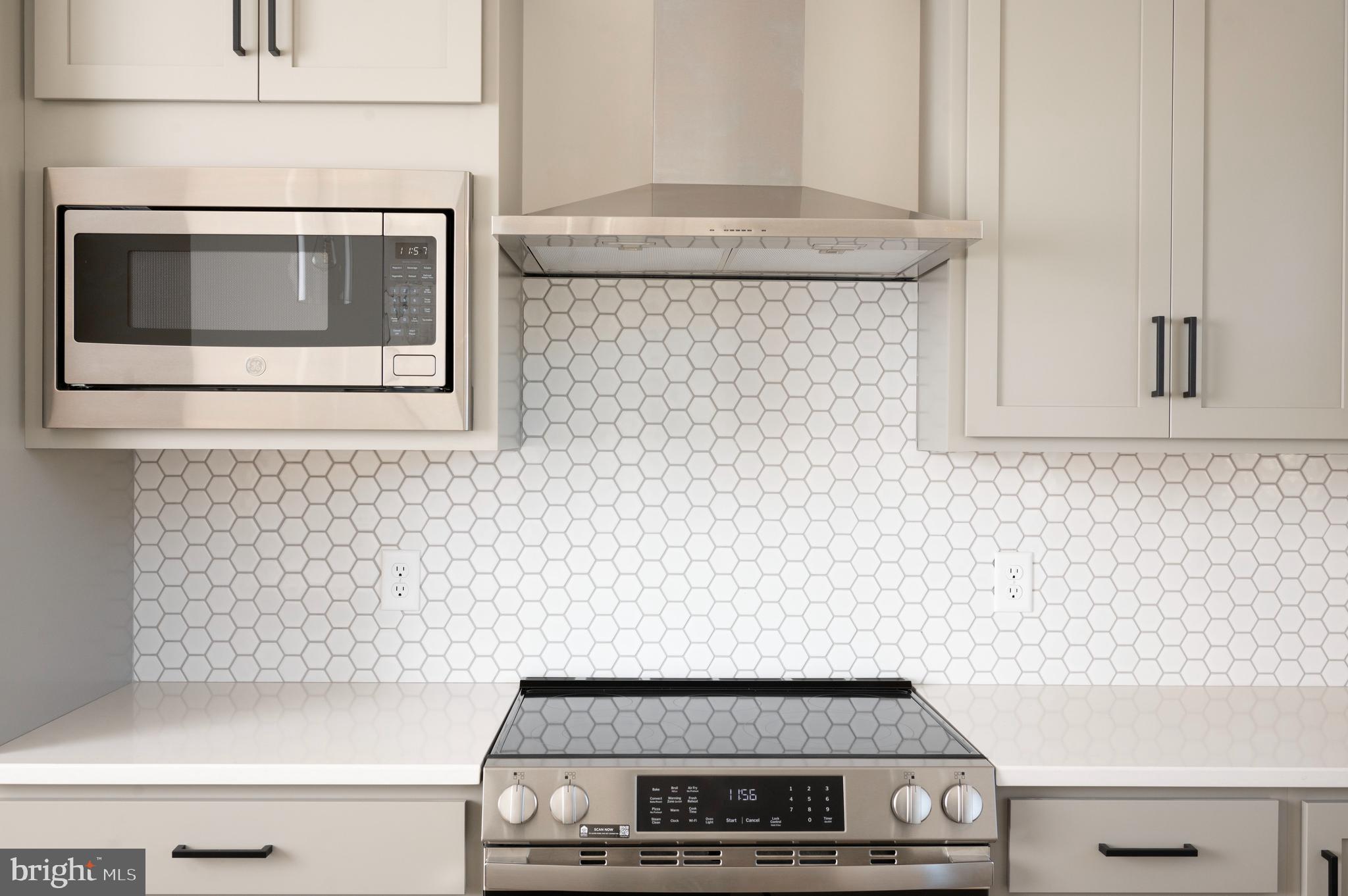 2453 Spring Water Circle Lancaster, PA 17601 - Photo 5 of 12 a stove top oven sitting inside of a kitchen