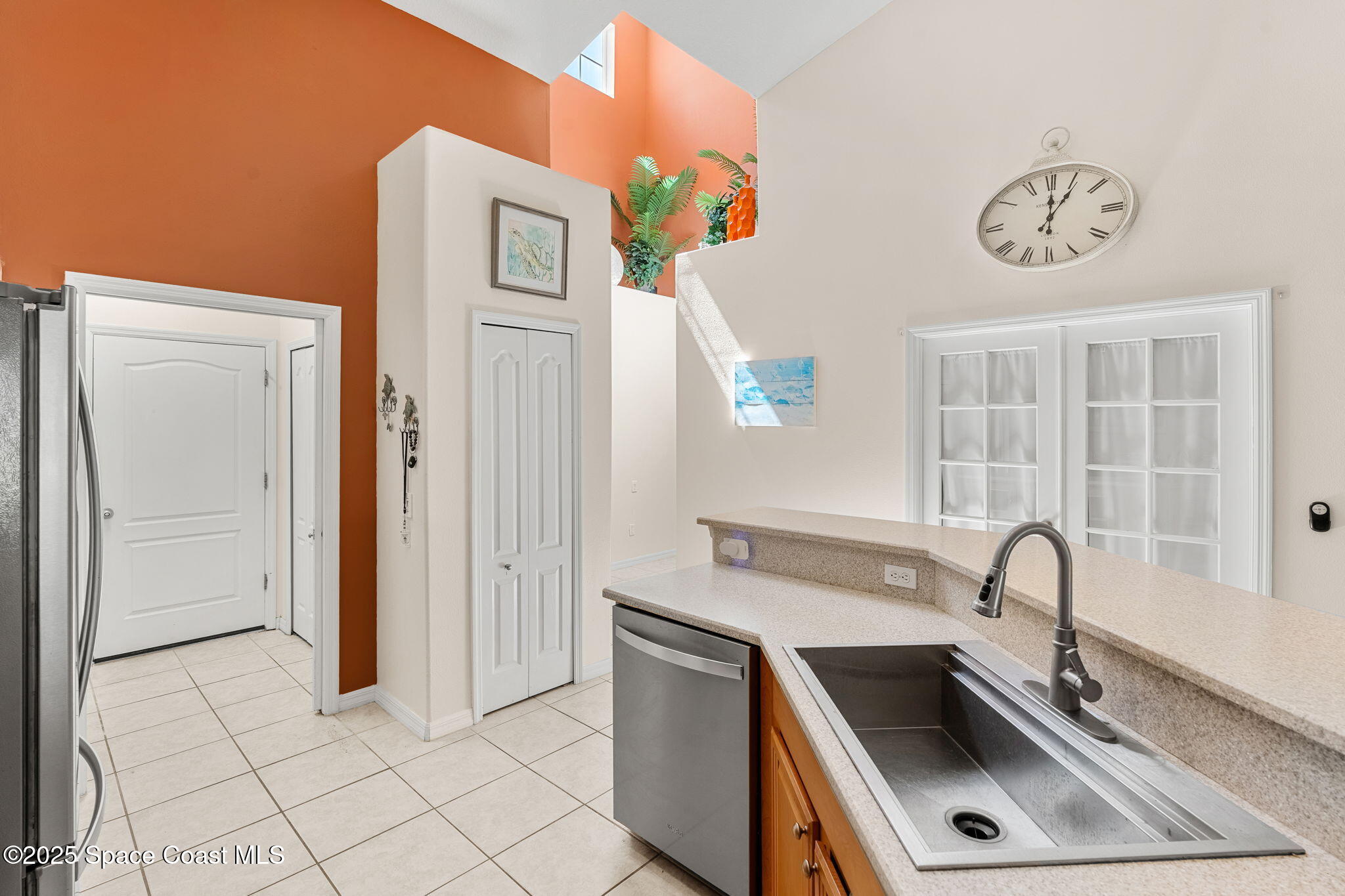 3130 Le Conte Street Melbourne, FL 32940 - Photo 16 of 35 a view of a kitchen with a sink and dishwasher