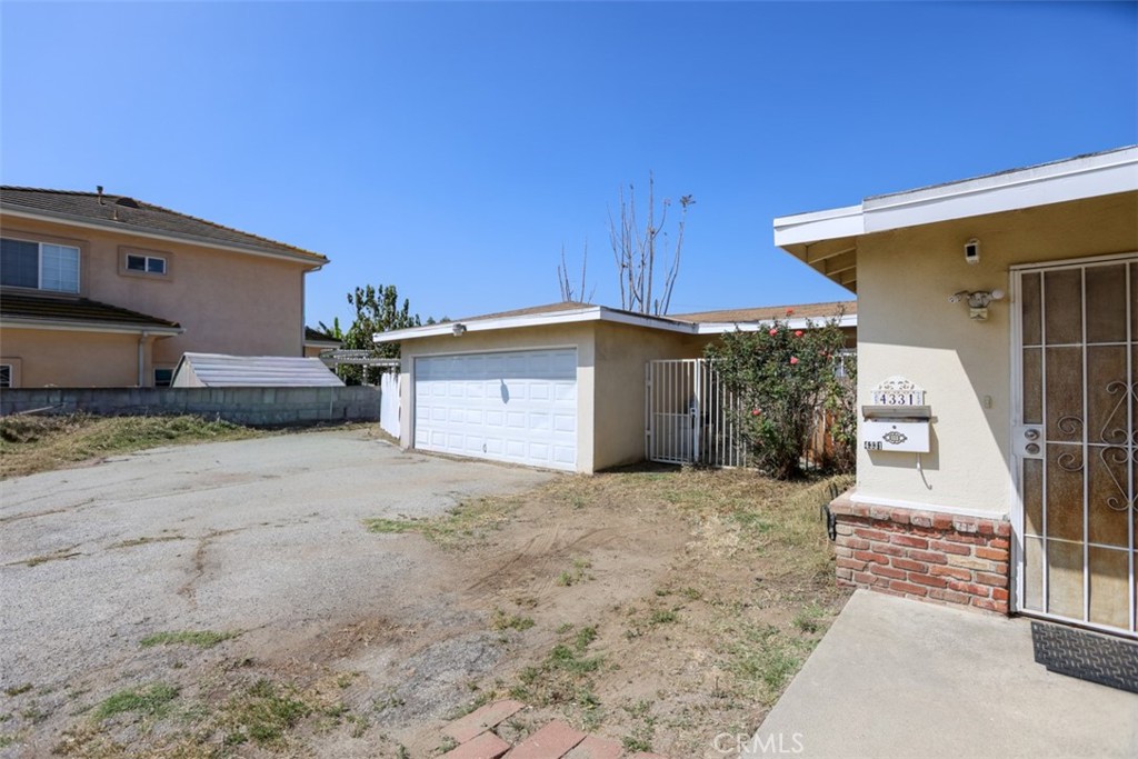 4331 Maxson Road El Monte, CA 91732 - Photo 24 of 32 a view of a house with a yard