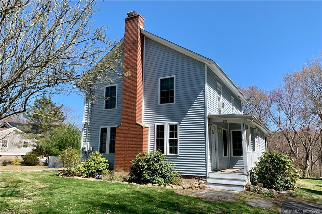 a front view of house with yard