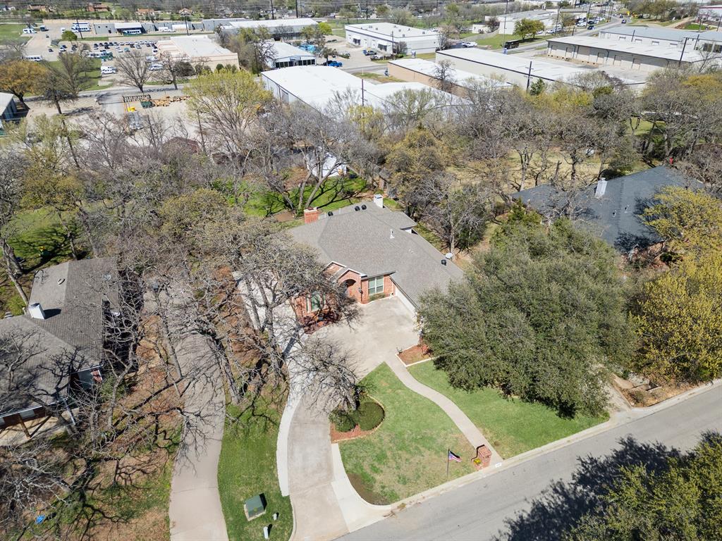 1007 Santa Fe Street Denton, TX 76205 - Photo 32 of 37 a view of a yard with a swimming pool