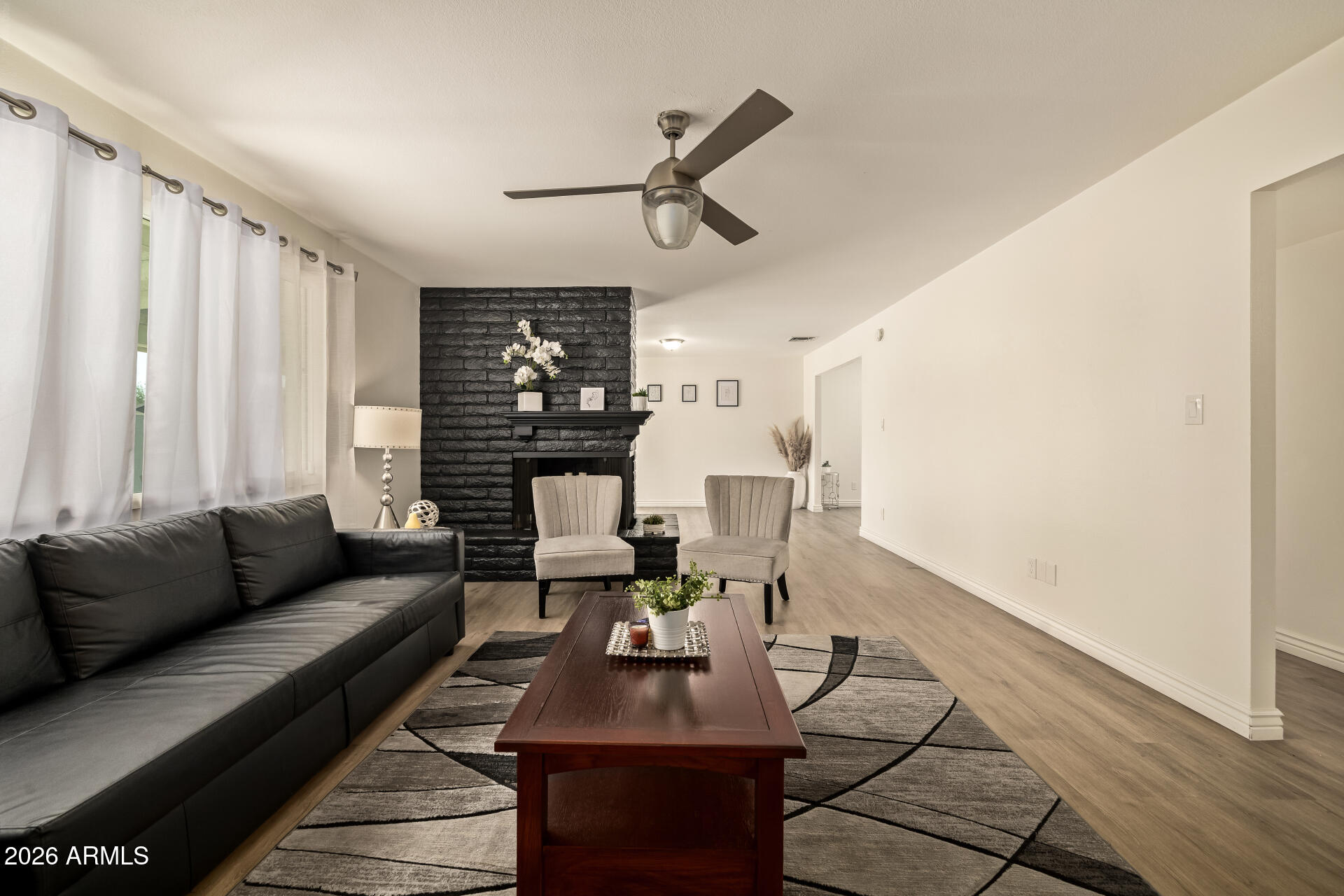 3101 West Shangri-la Road Phoenix, AZ 85029 - Photo 12 of 37 a living room with furniture and a large window