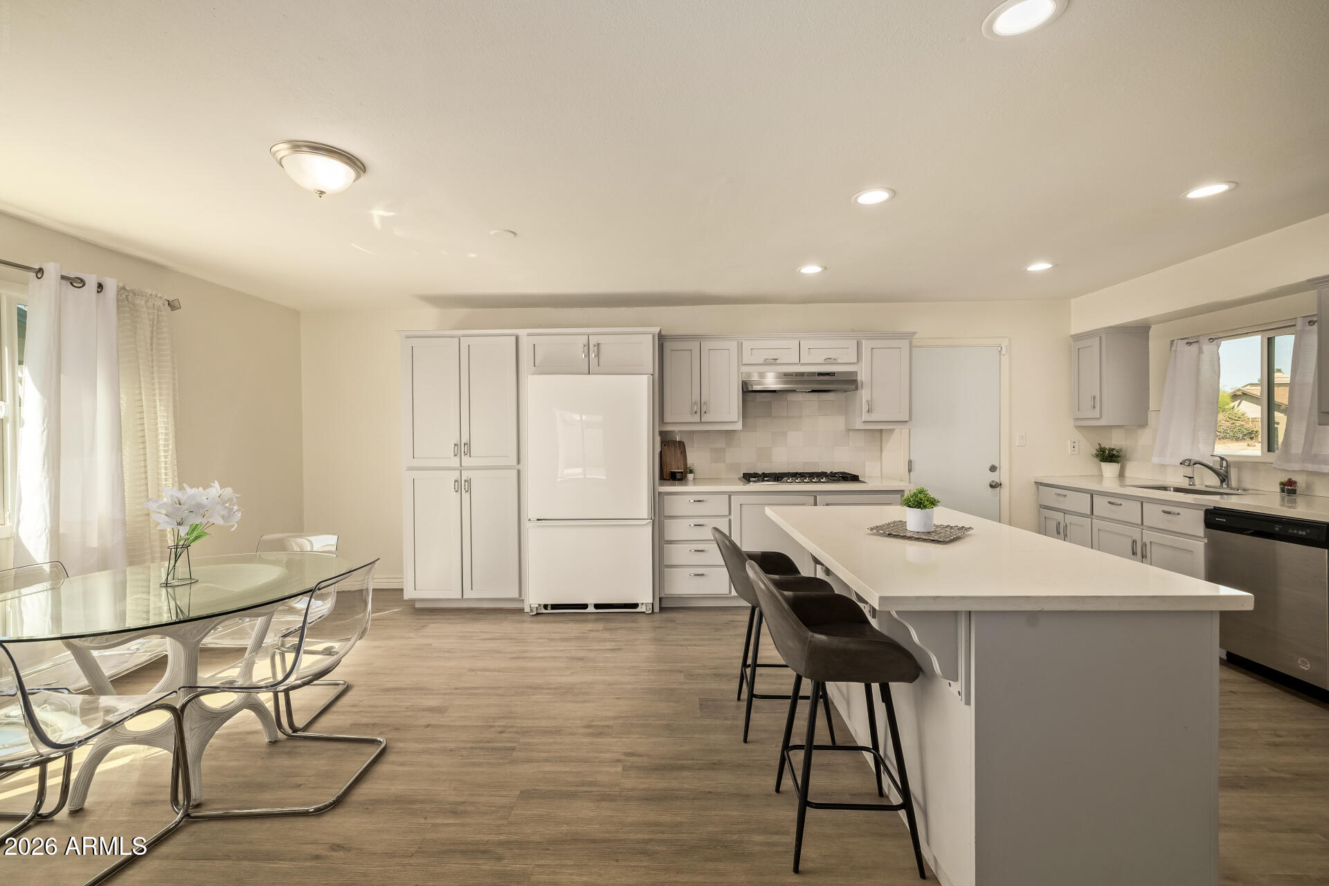 3101 West Shangri-la Road Phoenix, AZ 85029 - Photo 18 of 37 a kitchen with a table and chairs in it