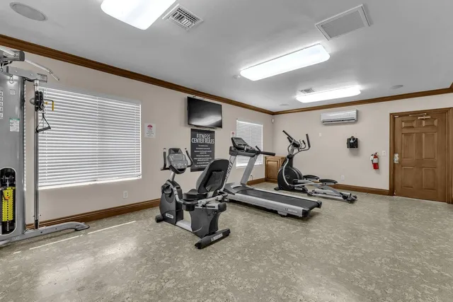 a view of a room with gym equipment