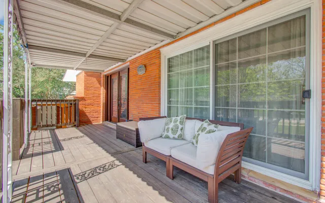 a view of a living room and wooden floor