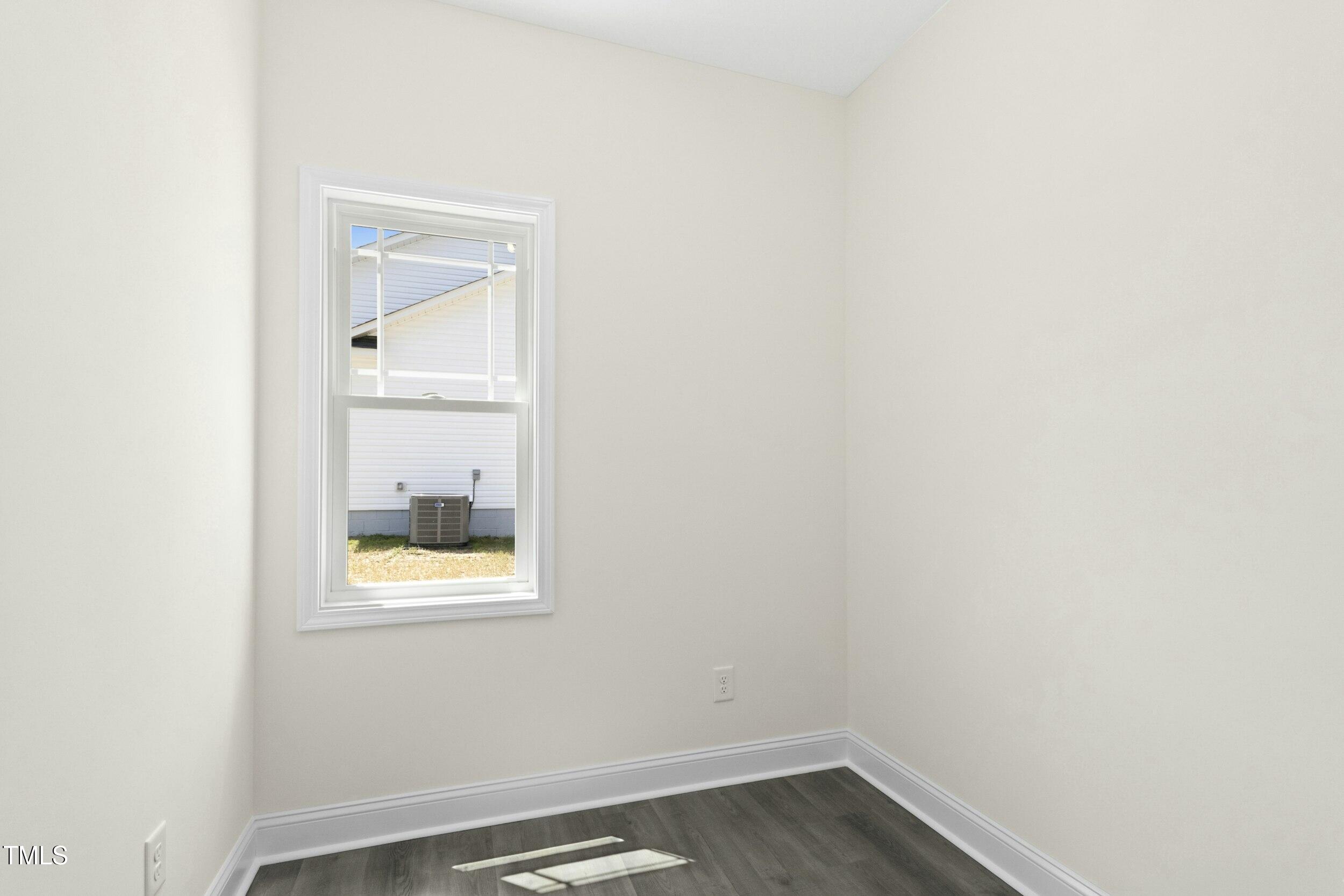 776 Shadetree Road Benson, NC 27504 - Photo 26 of 35 a view of small space with wooden floor and a window