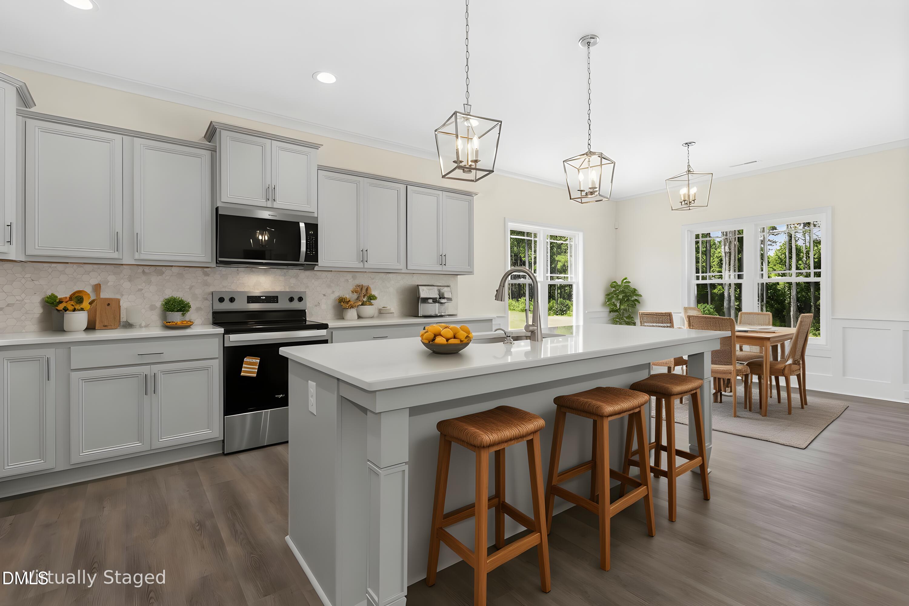 776 Shadetree Road Benson, NC 27504 - Photo 2 of 35 a kitchen with stainless steel appliances granite countertop a stove a sink a microwave a center island and chairs