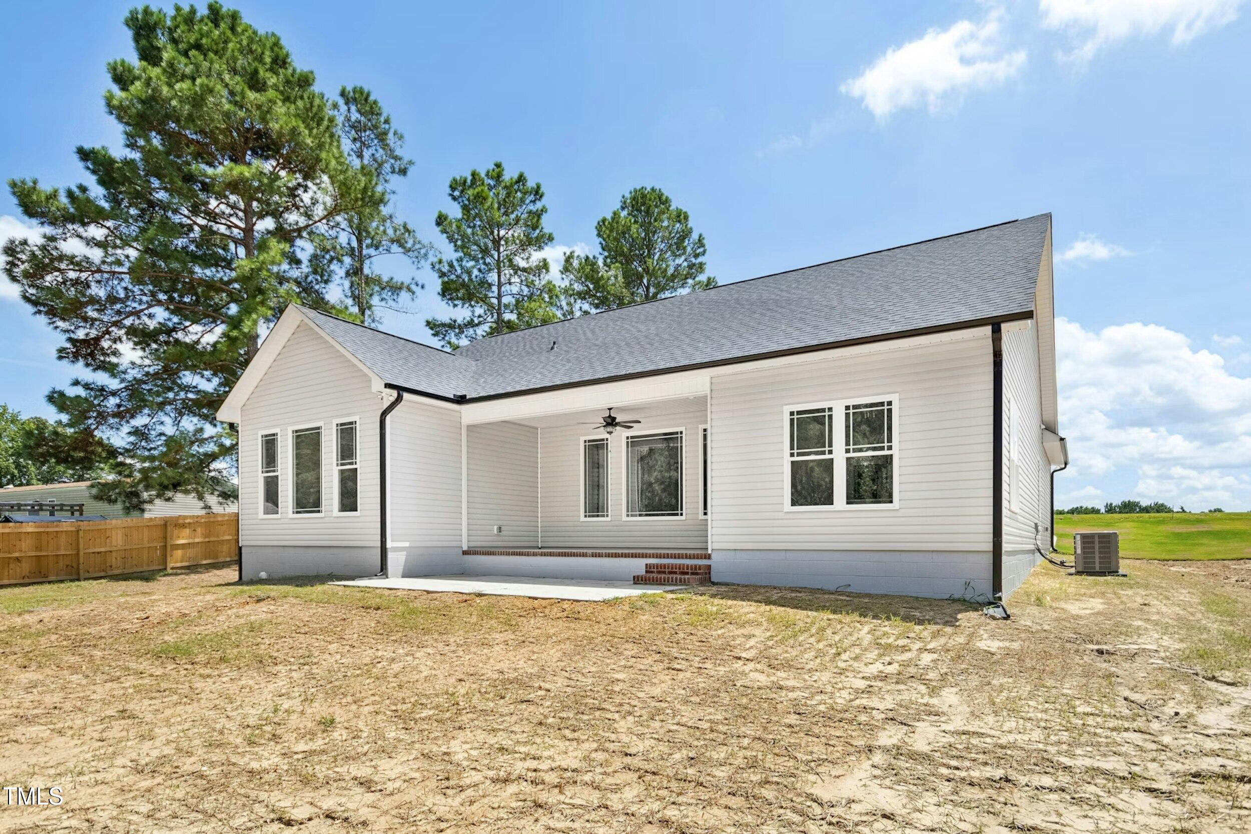 776 Shadetree Road Benson, NC 27504 - Photo 31 of 35 a house view with a garden space