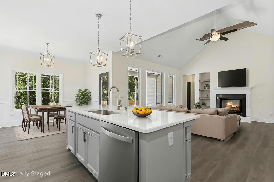 776 Shadetree Road Benson, NC 27504 - Photo 5 of 35 a view of living room with kitchen island furniture and fireplace