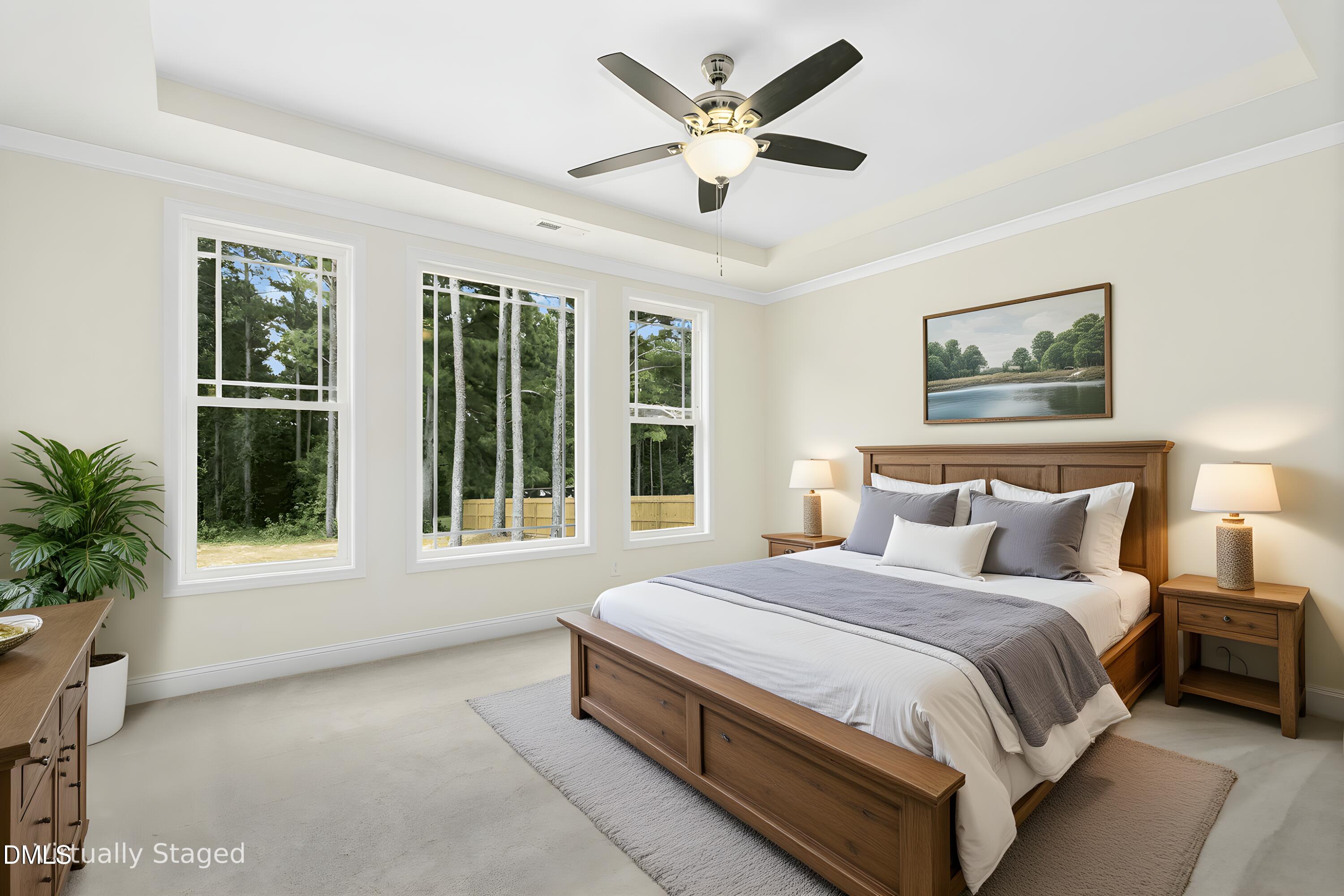 776 Shadetree Road Benson, NC 27504 - Photo 6 of 35 a spacious bedroom with a large bed and a large window