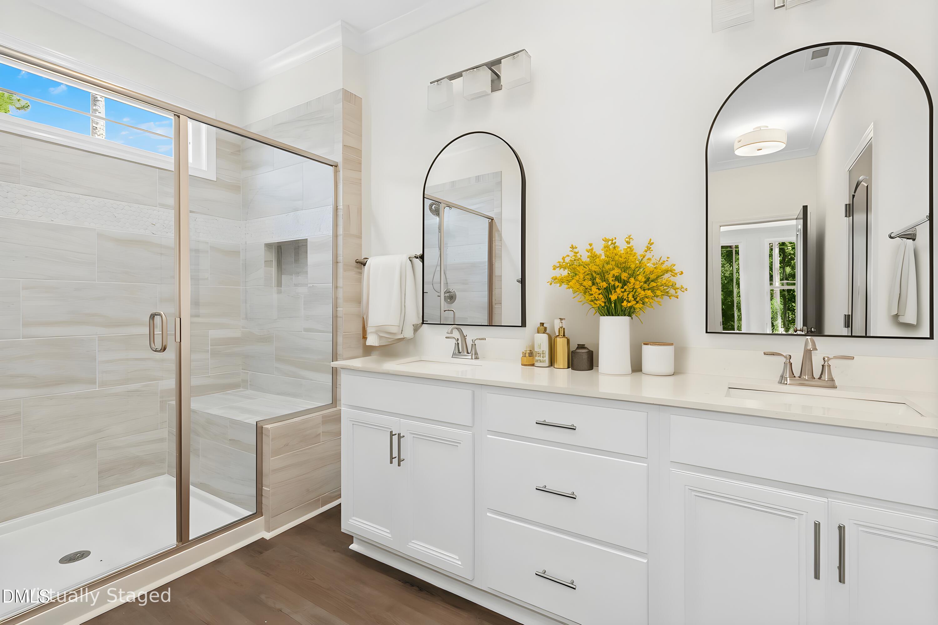 776 Shadetree Road Benson, NC 27504 - Photo 7 of 35 a bathroom with a double vanity sink mirror and shower