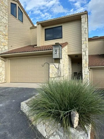 a view of a house with a balcony