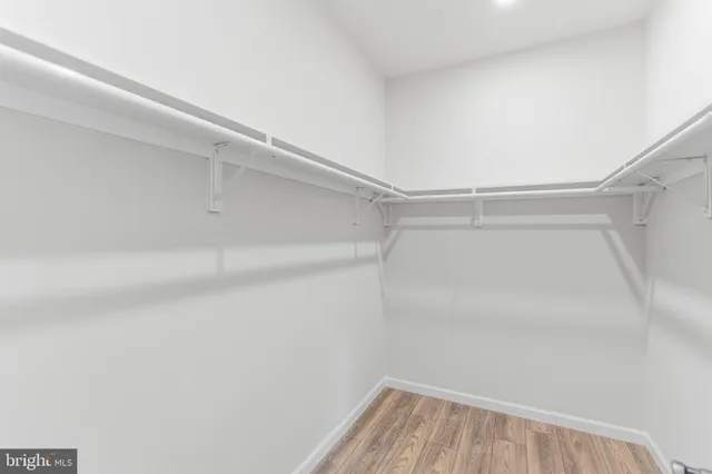 a view of a room with racks on the wall