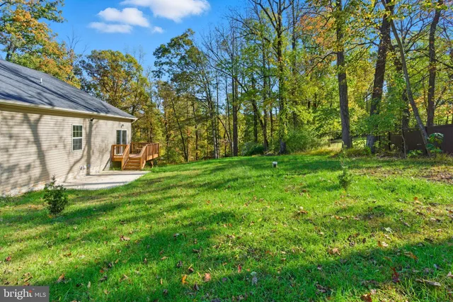 a view of a backyard with a garden