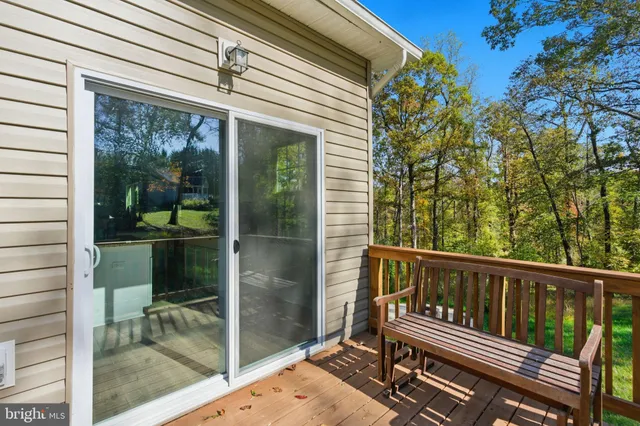 a view of a two chairs in the balcony