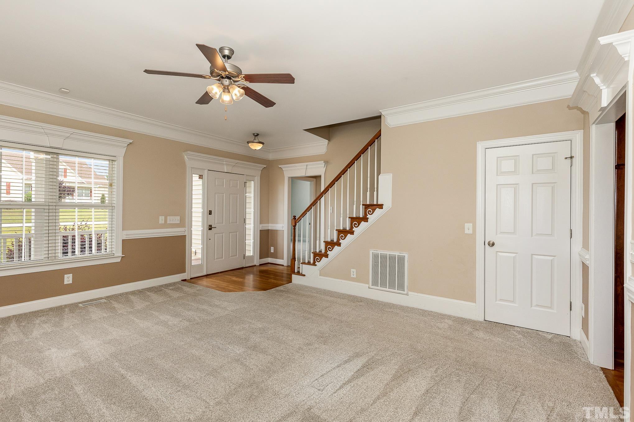 292 Ina Joe Place Willow Spring, NC 27592 - Photo 6 of 34 a view of an empty room with a window