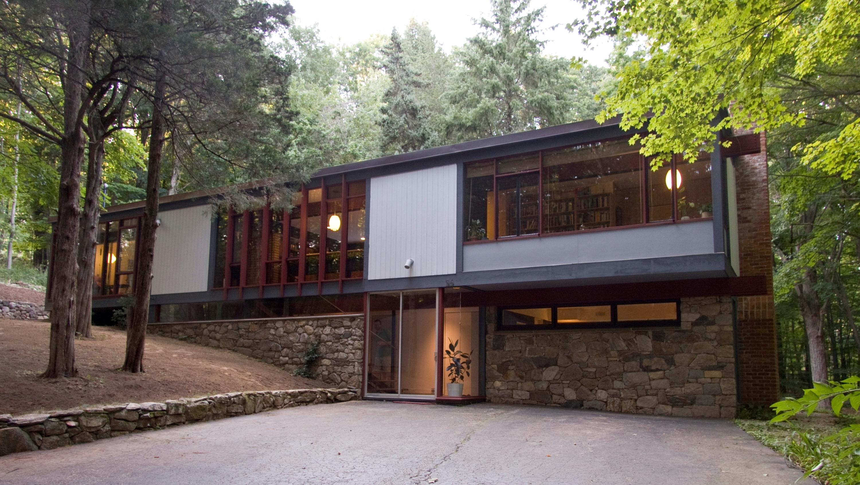 a view of a house with a tree beside it