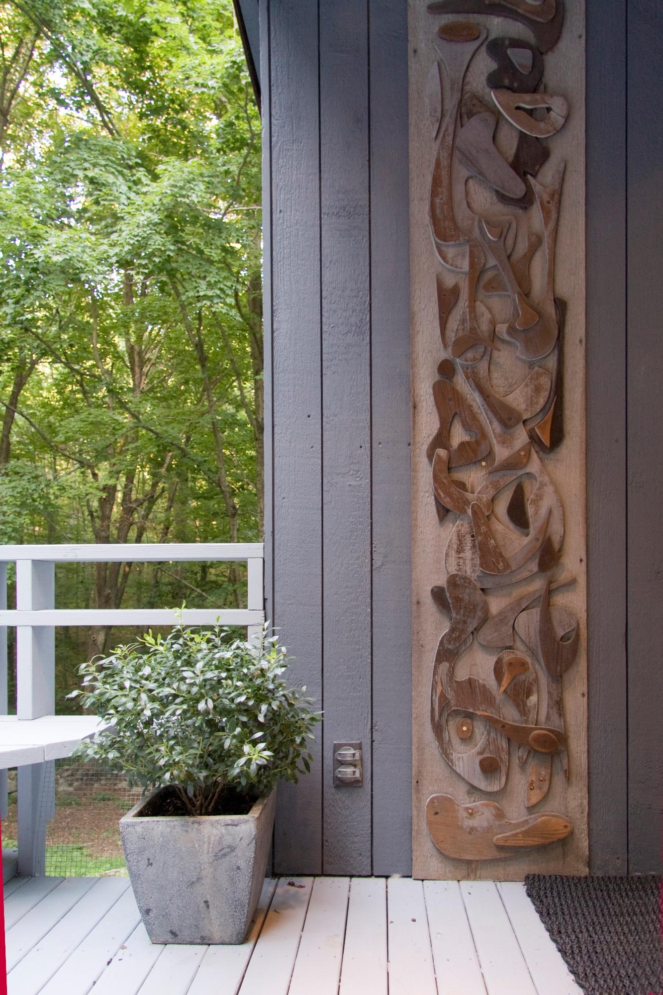 56 Farrell Road Weston, CT 06883 - Photo 16 of 33 a view of a door and chair in pots