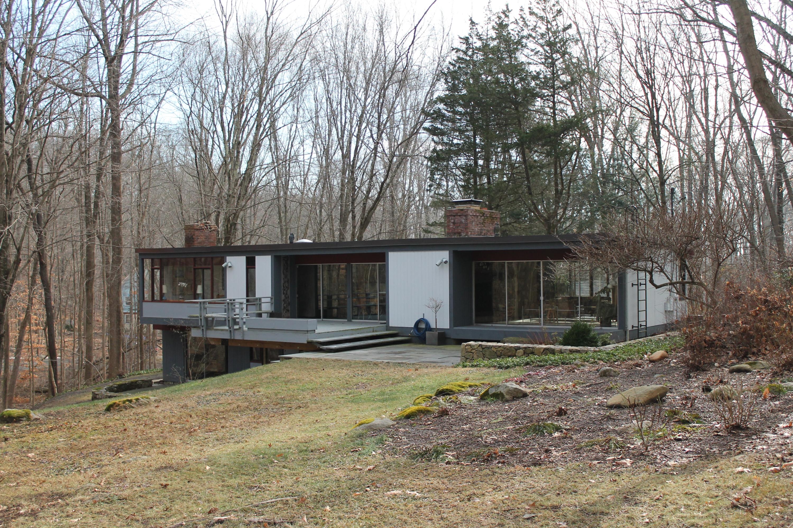 56 Farrell Road Weston, CT 06883 - Photo 7 of 33 a front view of a house with garden