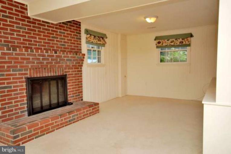5308 Atlee Place Springfield, VA 22151 - Photo 14 of 14 a view of an empty room with a fireplace