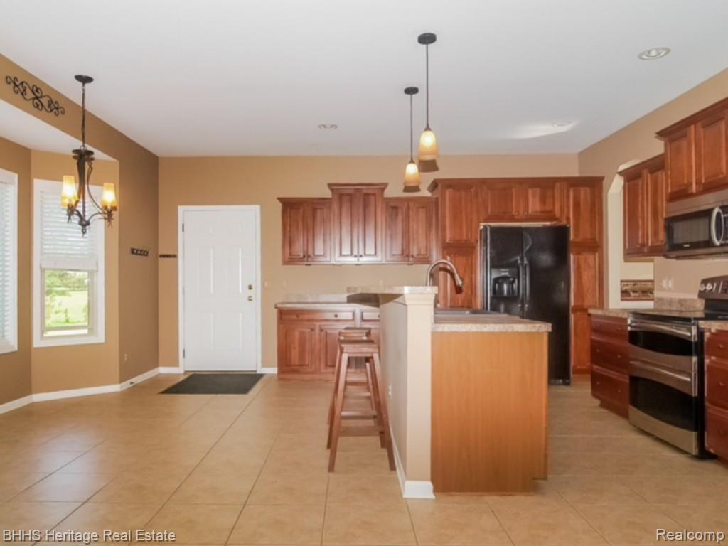 6961 West Lange Road Fowlerville, MI 48836 - Photo 6 of 26 photo 4.jpg