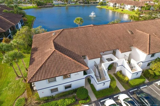 a kitchen with stainless steel appliances cabinets a sink and a stove