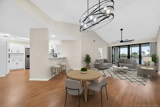 a kitchen with a sink stove and microwave