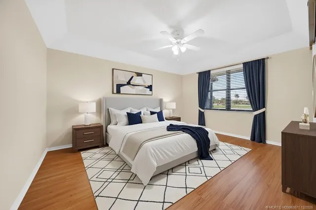 a spacious bathroom with a double vanity sink a mirror and shower