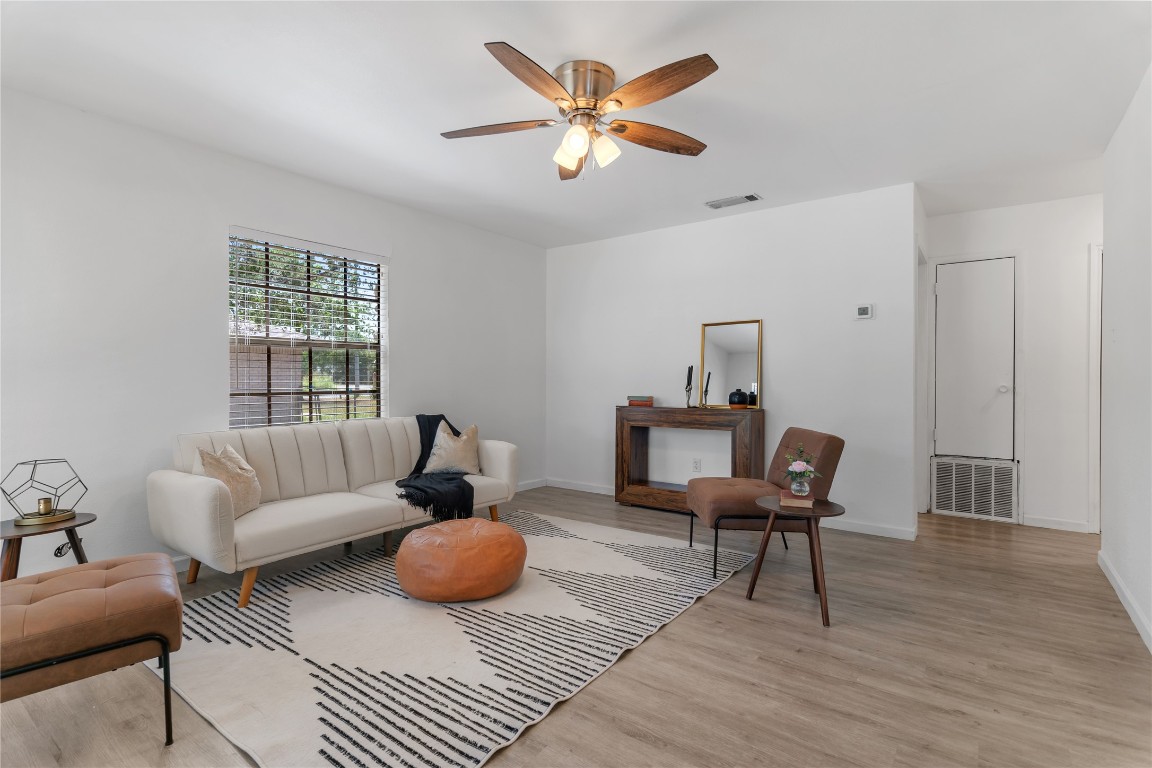 607 Magnolia Street Bastrop, TX 78602 - Photo 1 of 25 a living room with furniture and a window