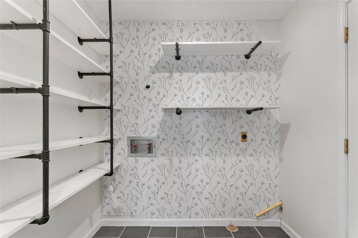 607 Magnolia Street Bastrop, TX 78602 - Photo 16 of 25 a bathroom with a shower