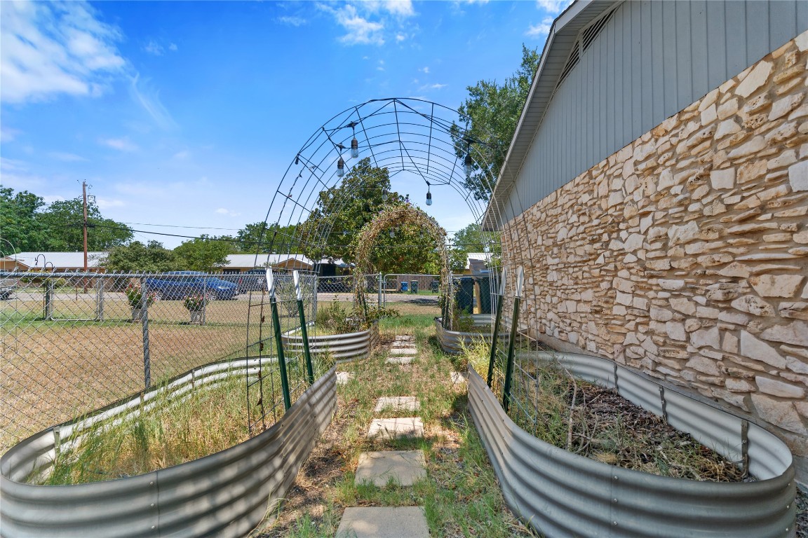 607 Magnolia Street Bastrop, TX 78602 - Photo 23 of 25 a view of a swimming pool with a patio