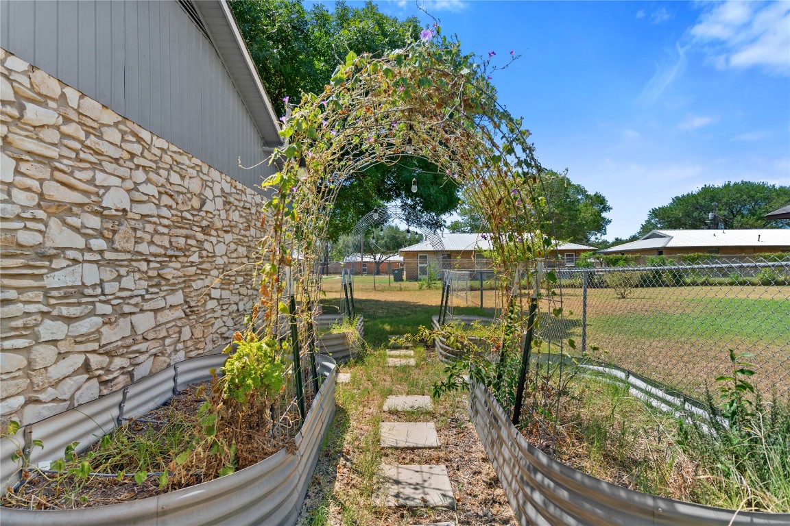 607 Magnolia Street Bastrop, TX 78602 - Photo 24 of 25 a view of a garden with plants
