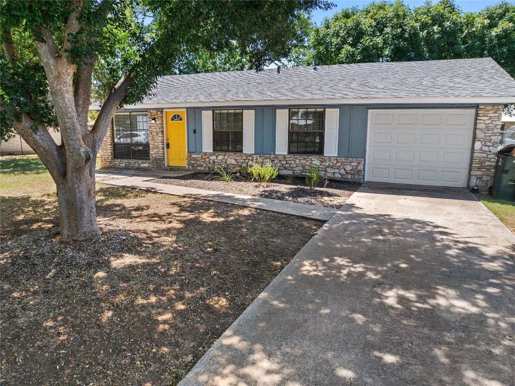607 Magnolia Street Bastrop, TX 78602 - Photo 5 of 25 a front view of house with yard