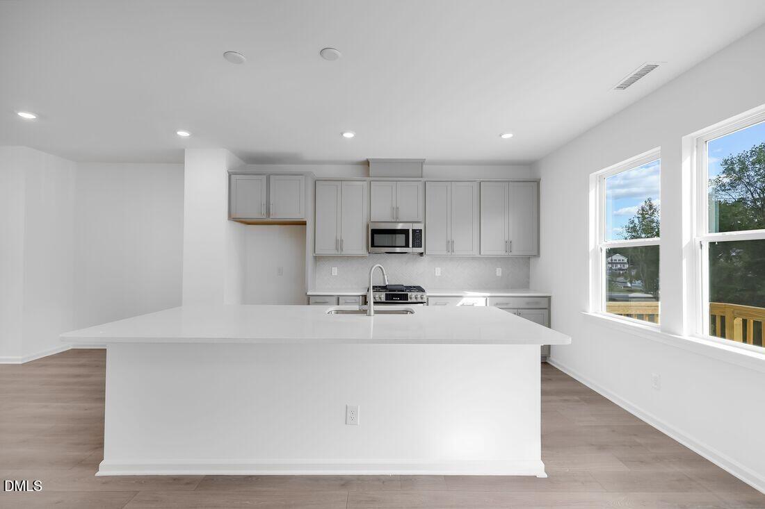 430 Rowe Way Knightdale, NC 27545 - Photo 9 of 51 greystone-kitchen-01