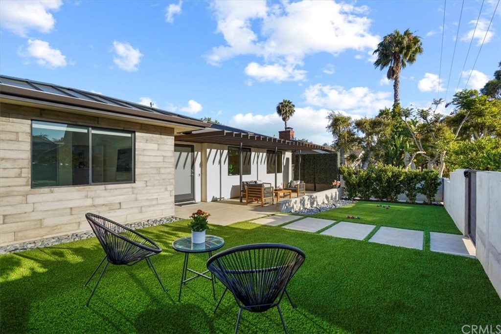 361 Aster Street Laguna Beach, CA 92651 - Photo 2 of 25 a view of a house with backyard porch and sitting area