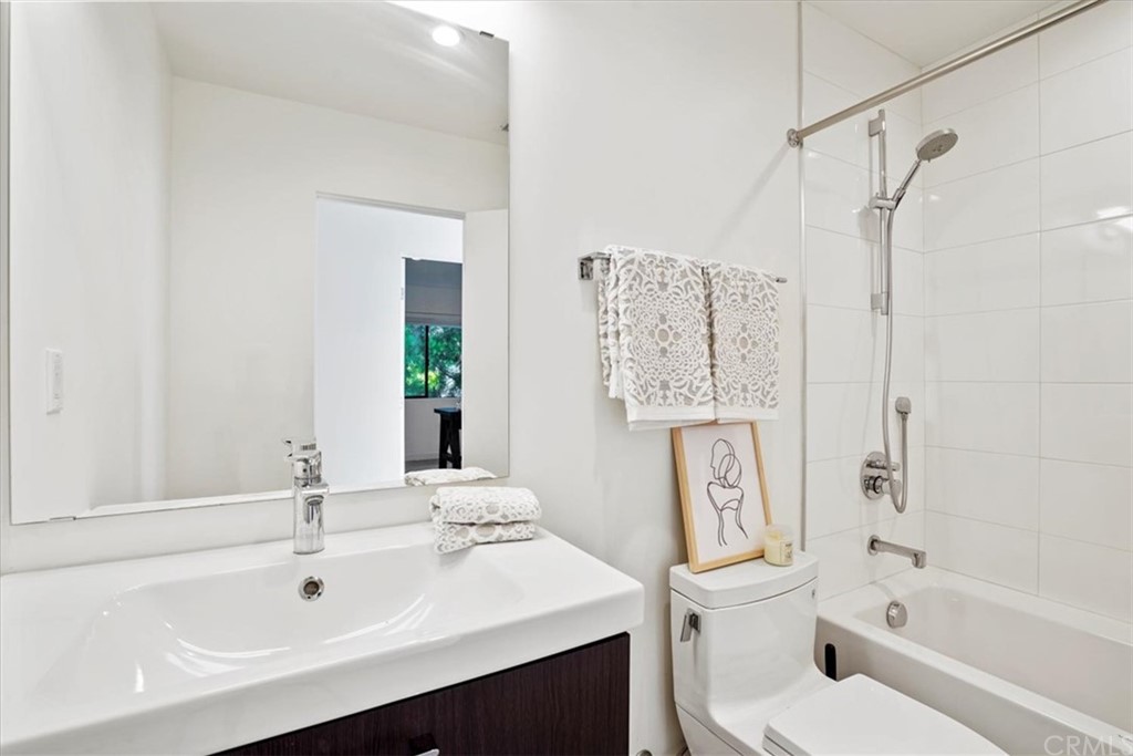 361 Aster Street Laguna Beach, CA 92651 - Photo 22 of 25 a bathroom with a sink a toilet and shower