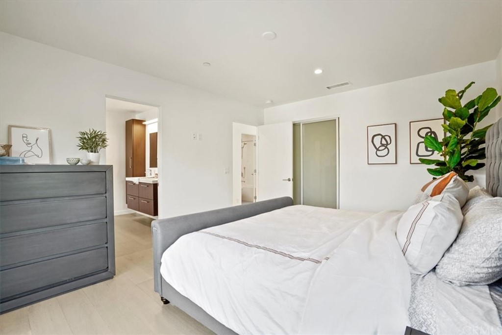 361 Aster Street Laguna Beach, CA 92651 - Photo 24 of 25 a bedroom with a bed and a dresser