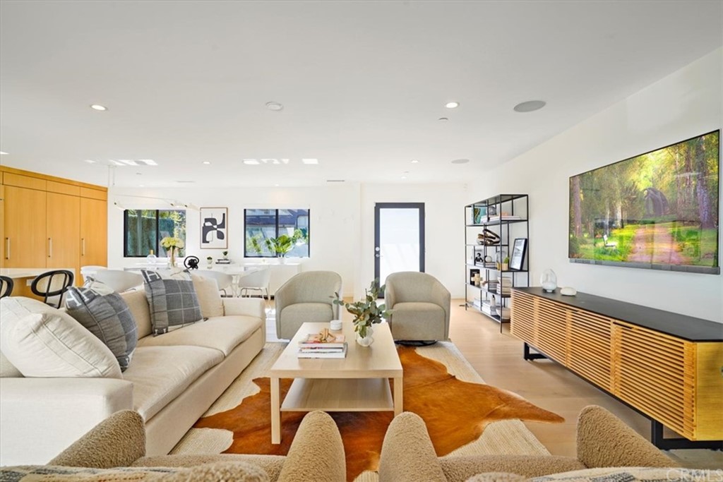 361 Aster Street Laguna Beach, CA 92651 - Photo 3 of 25 a living room with furniture and a flat screen tv