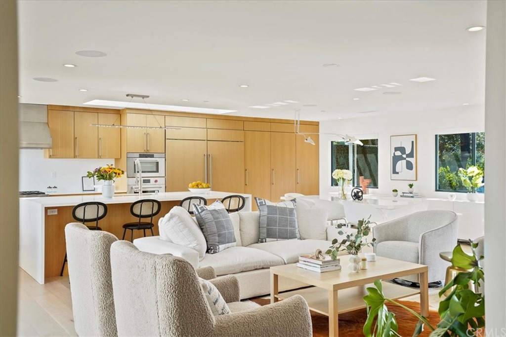 361 Aster Street Laguna Beach, CA 92651 - Photo 4 of 25 a living room with furniture and a wooden floor