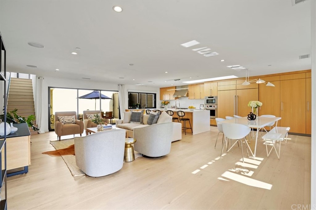 361 Aster Street Laguna Beach, CA 92651 - Photo 5 of 25 a living room with lots of furniture and a large window